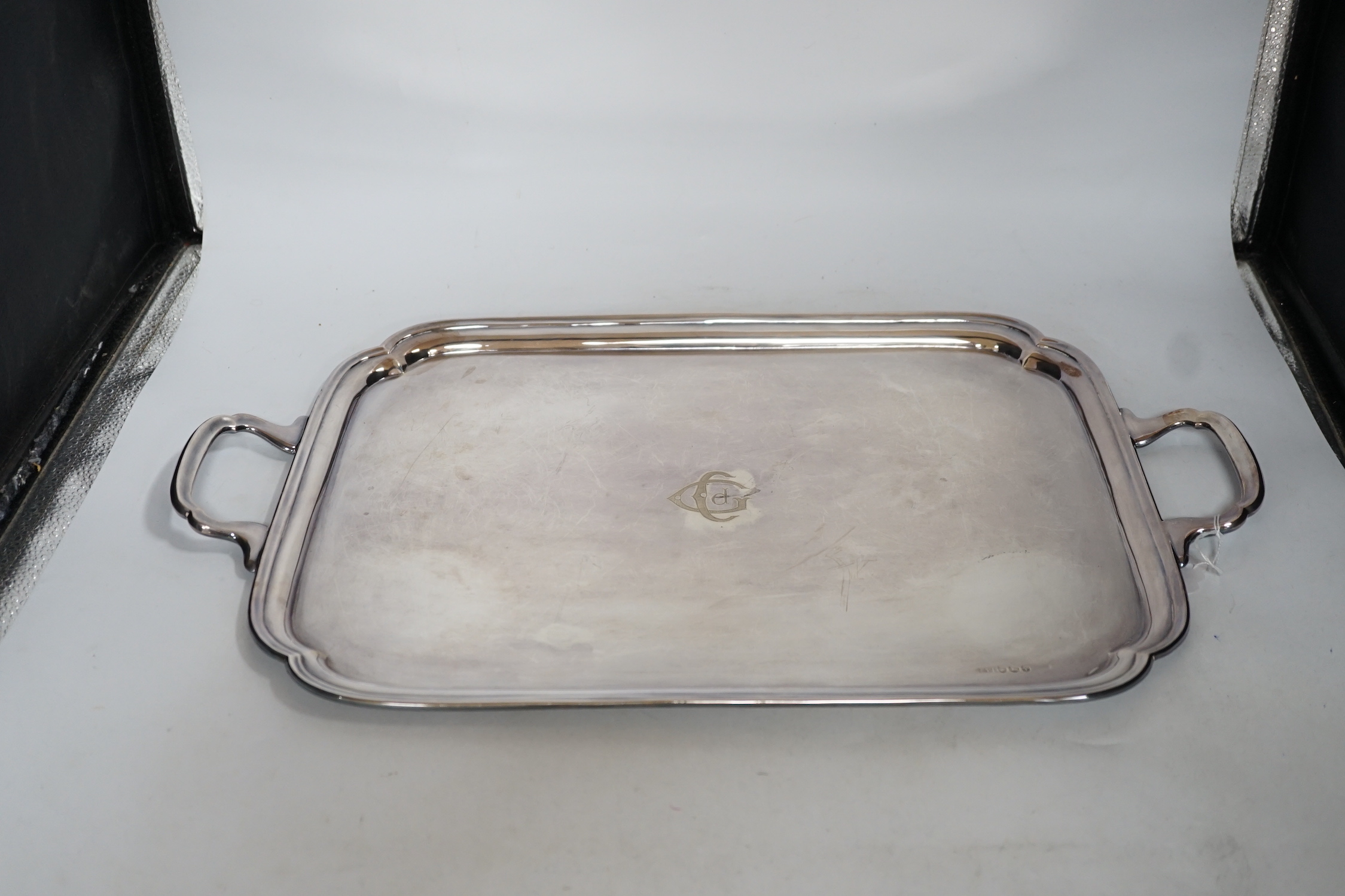 An Elizabeth II silver two handled tea tray, by Viners Ltd, Sheffield, 1966, 56.2cm over handles, 63.7oz.
